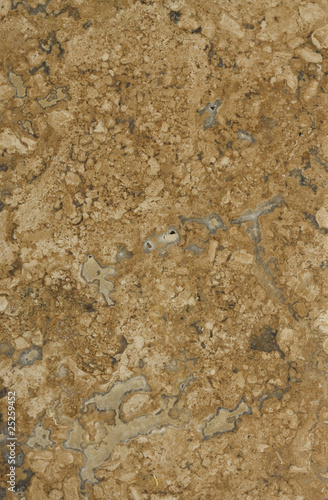 Surface of the travertine. Brown and honey yellow shades.