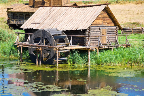 Vintage wooden water mill © JackF