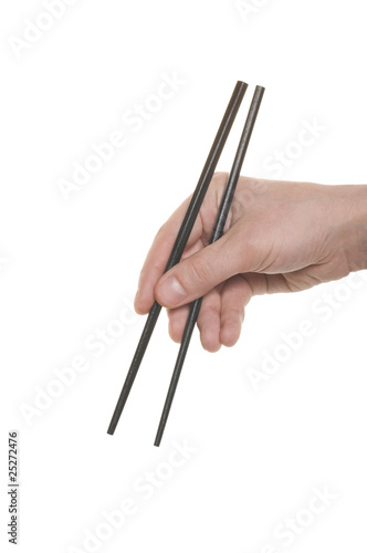 well shaped hand with a chopsticks isolated over white