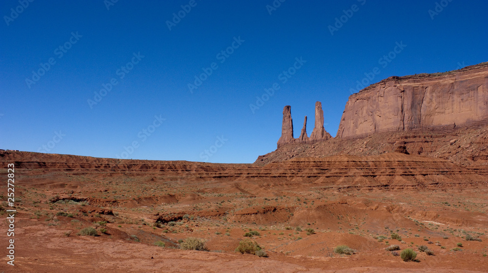 Landscape of Monument Valley with Three Sisters