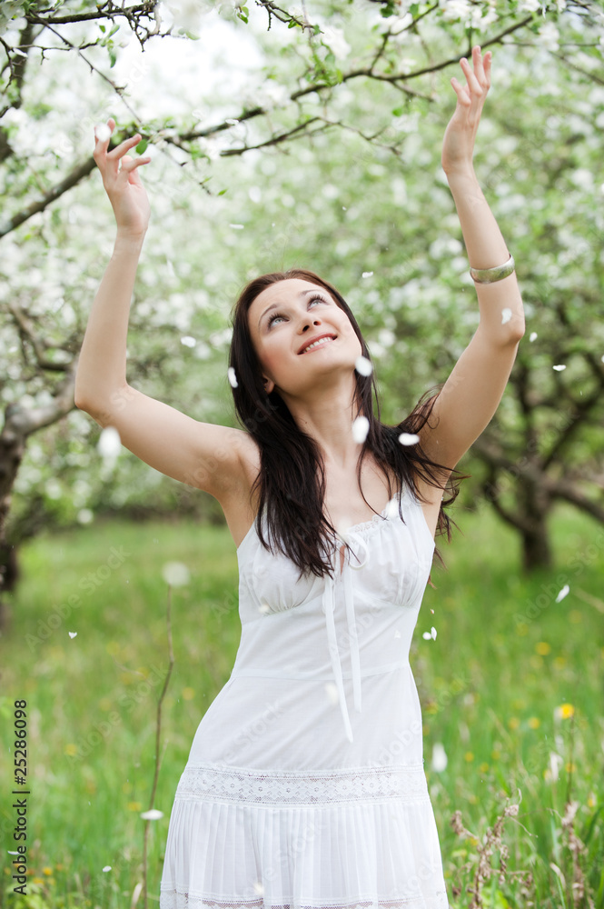 carefree young woman in park carefree young woman in park