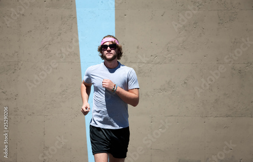 Young man runs for a healthy weight photo