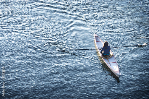 Fototapeta Young Woman in Rowboat