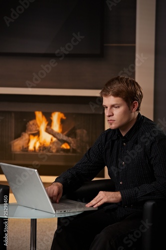 Man using computer at home