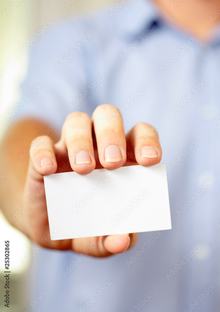 Man holding blank visiting card Man holding blank visiting card