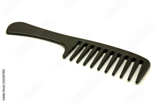 black plastic comb isolated on white background