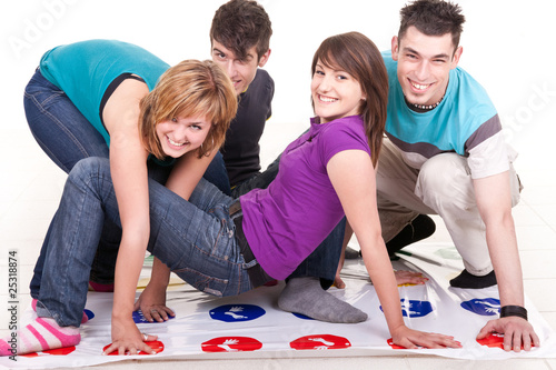 teenagers  playing twister