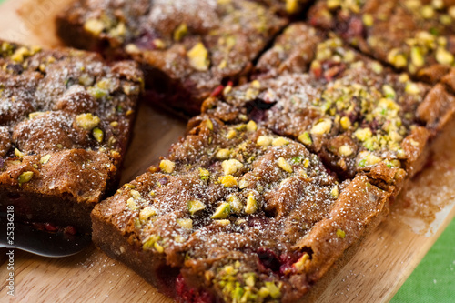 Chocolate cake with raspberries and pistachio