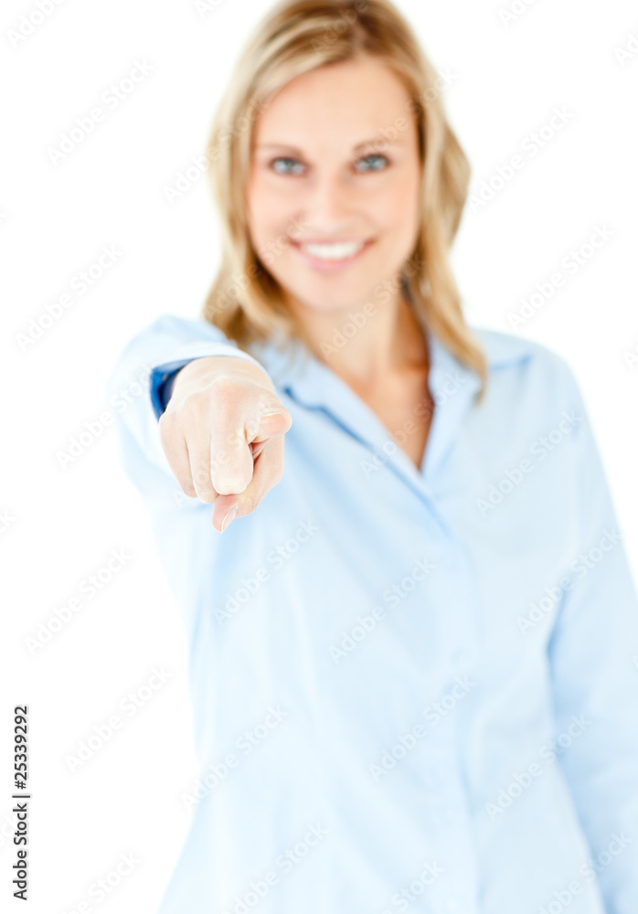 Bright young businesswoman showing with a finger at the camera Bright young businesswoman showing with a finger at the camera