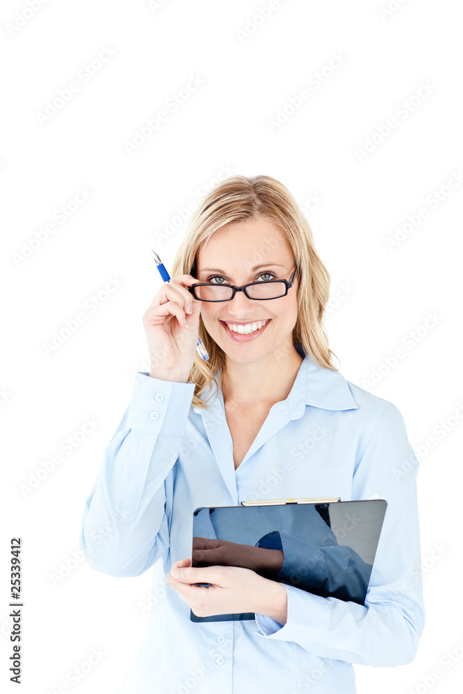 Self-assured businesswoman holding a clipboard Self-assured businesswoman holding a clipboard