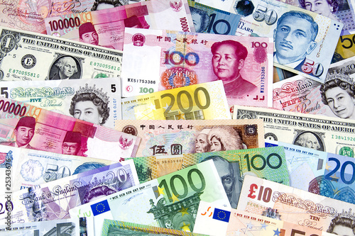 A collection of various currencies. photo