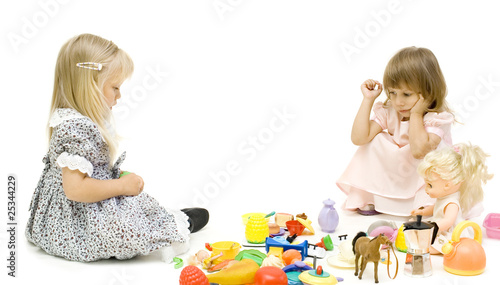 The two girls share a toy photo