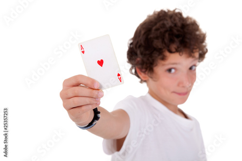 cute boy showing an ace of hearts