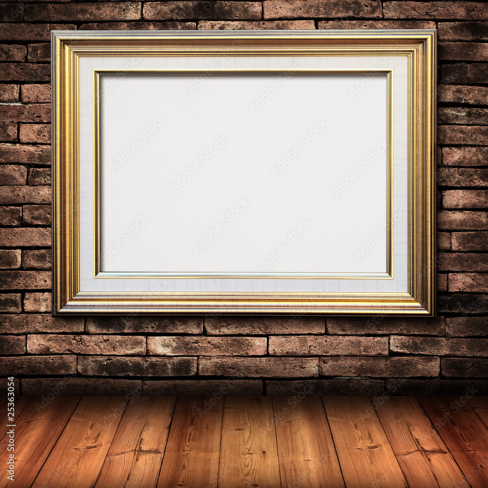 gold frame on brick wall gold frame on brick wall