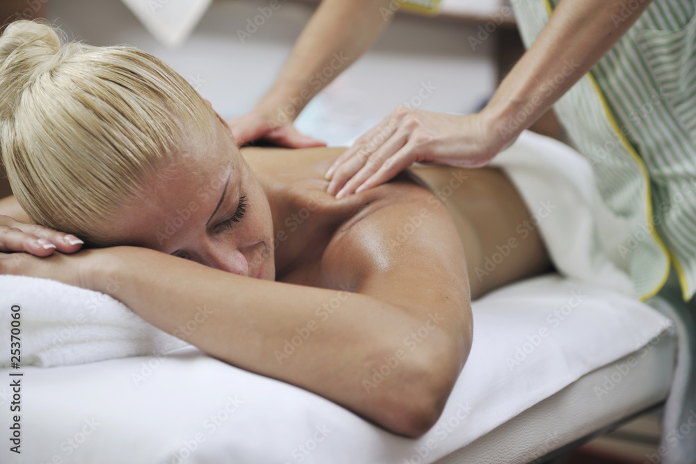 woman at spa and wellness back massage woman at spa and wellness back massage