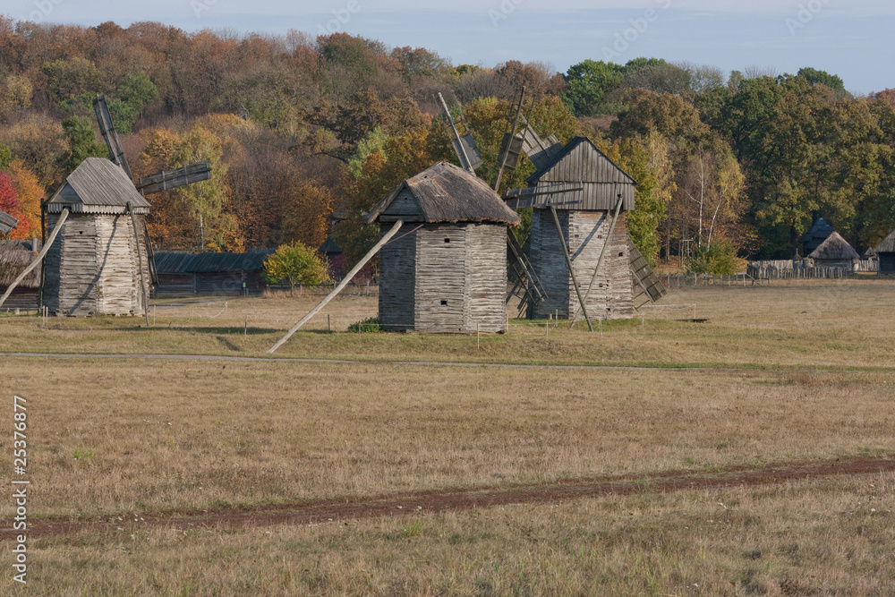 Country scenery. Autumn. Three windmills in the field. Country scenery. Autumn. Three windmills in the field.