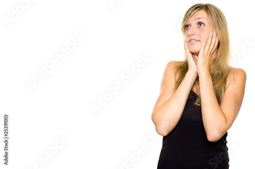 Close-up of a young woman looking surprised