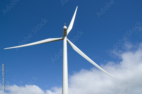 Wind turbine in blue sky with cloud © Gordon Saunders