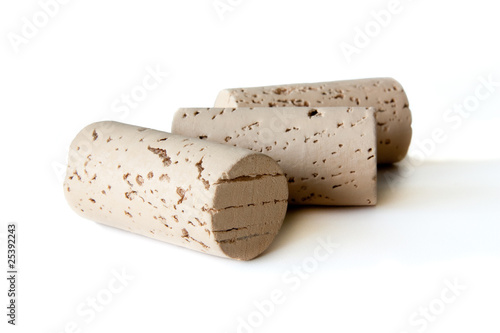 Three wine corks isolated on white background