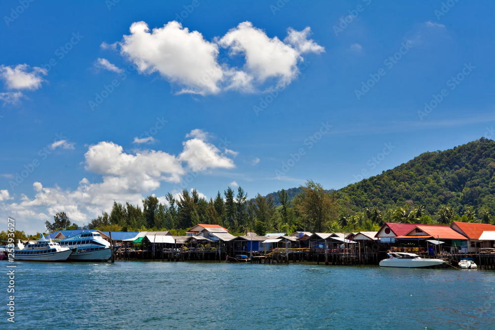 Tropical island under blue sky. Thailand
