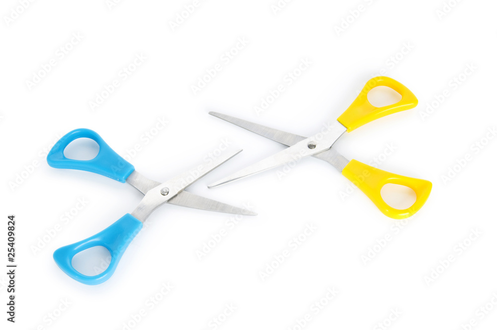 Pair of scissors isolated on the white background Pair of scissors isolated on the white background