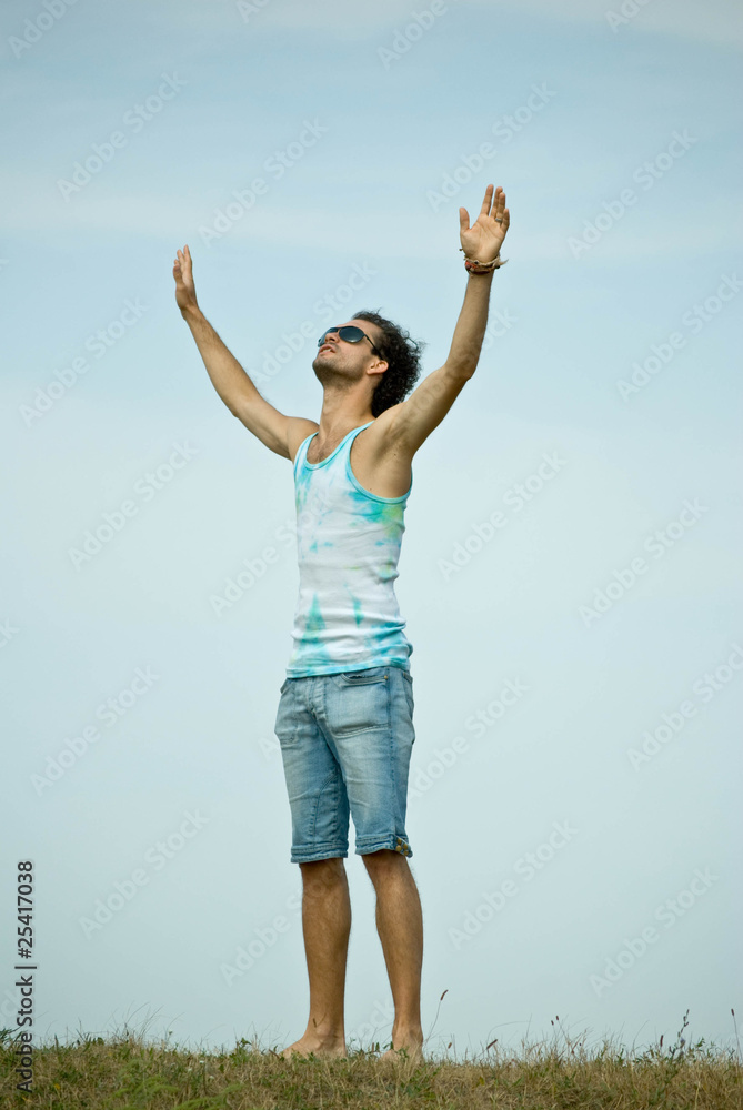 Man with his arms wide open