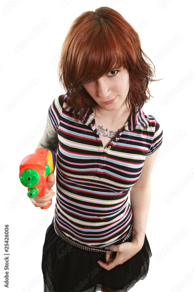 Pretty girl pointing squirt gun Pretty girl pointing squirt gun