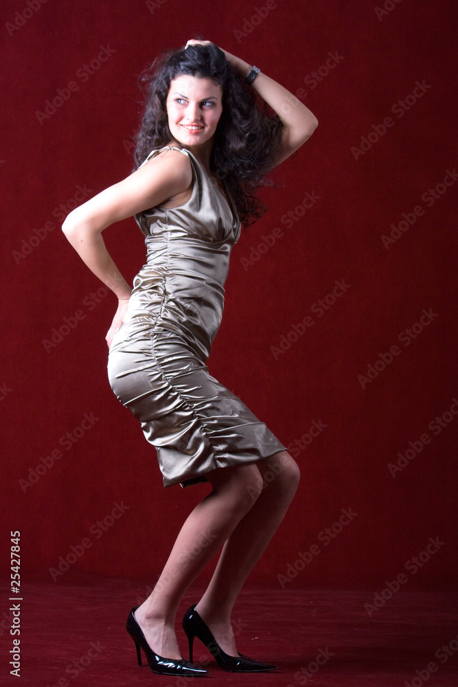 Attractive woman wearing satin dress Attractive woman wearing satin dress