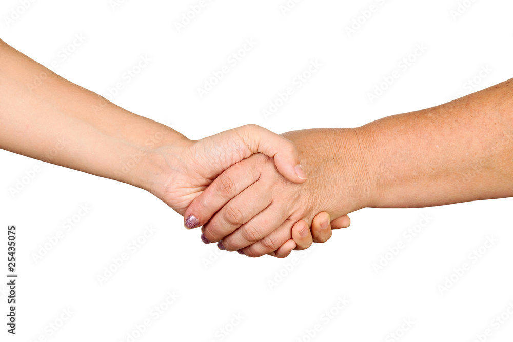 Closeup of business people shaking hands against