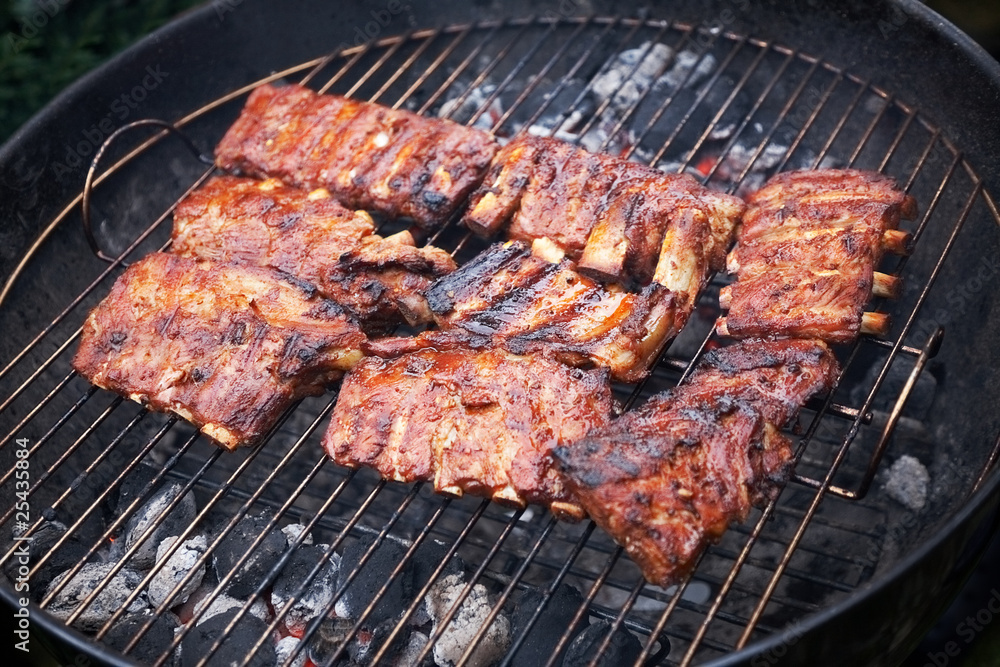 grilled pork ribs on bbq grill (shallow DOF)