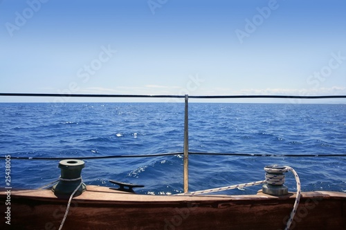 sailboat winches wooden board blue sea horizon © lunamarina