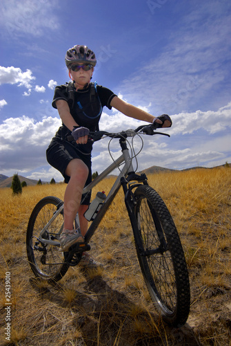 Young Woman Mountain Biking