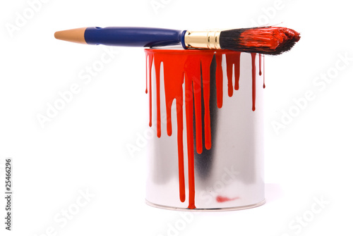 Can of red paint and professional brush on a white.