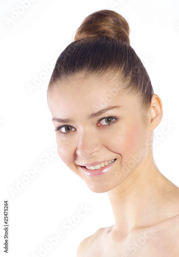 Beautiful young smiling woman with healthy skin