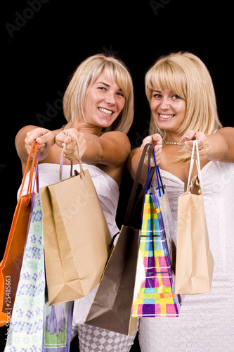 women carrying shopping bags