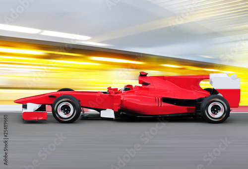 formula one race car on speed track