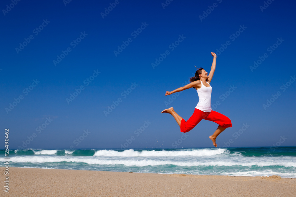 Young woman jumping