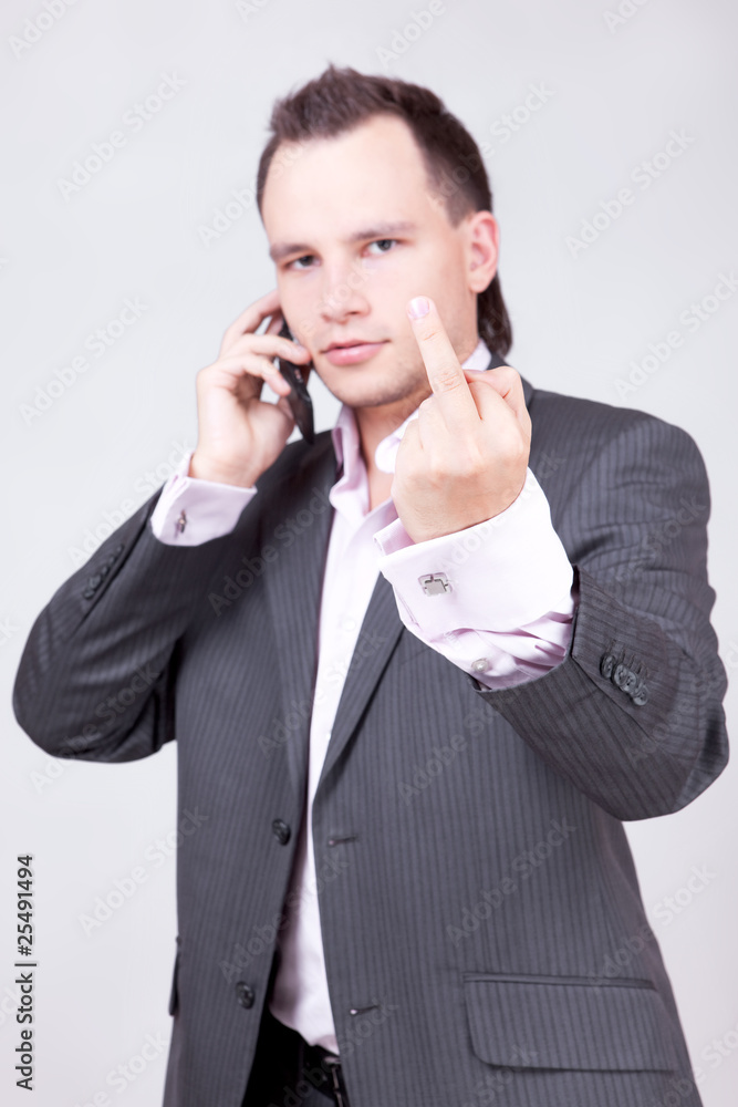 Portrait of business male model showing his love to you. Portrait of business male model showing his love to you.