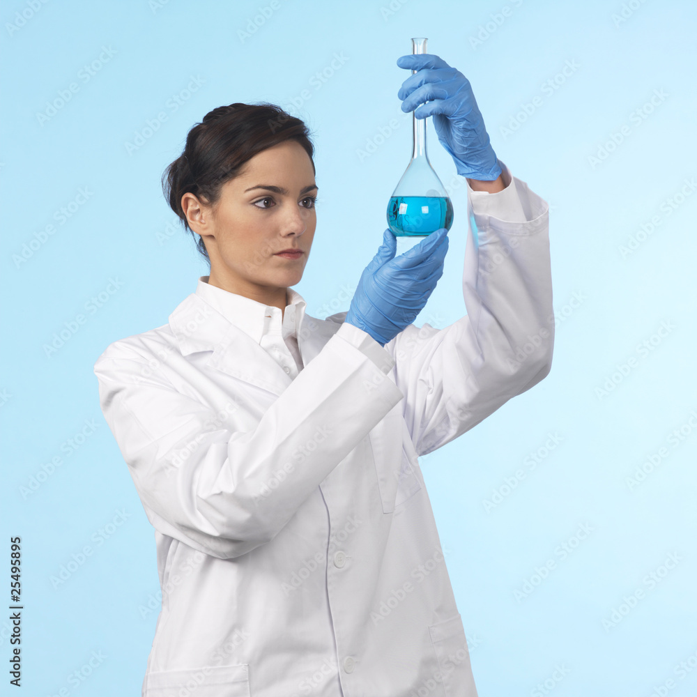 lab technician holding a flask lab technician holding a flask