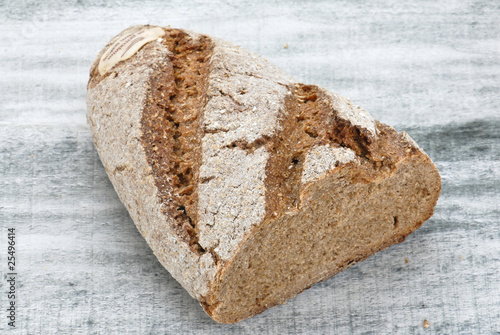Wholegrain bread on wooden table, healty food