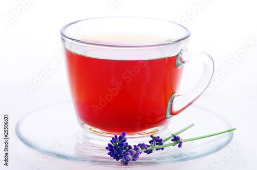 cup of herbal tea with flowers isolated on white