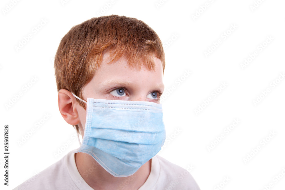 young boy with a medical mask