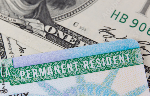 USA Permanent Resident card aka Green Card and paper money