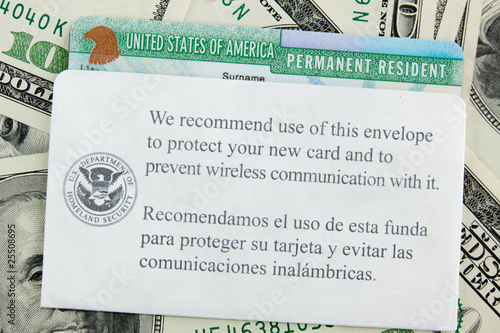 USA Permanent Resident card aka Green Card and paper money