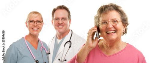 Happy Senior Woman Using Ce...