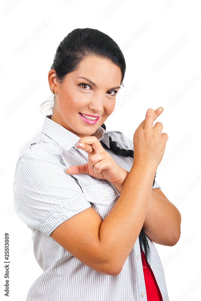 Happy woman holding fingers crossed