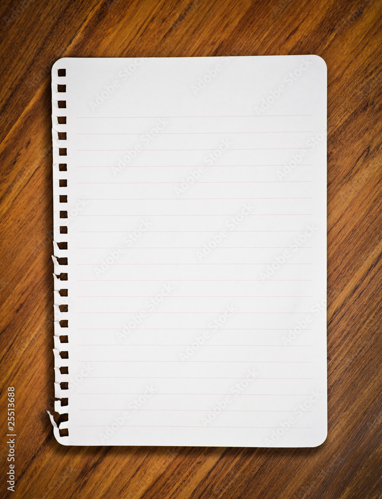 notebook paper on wood floor notebook paper on wood floor