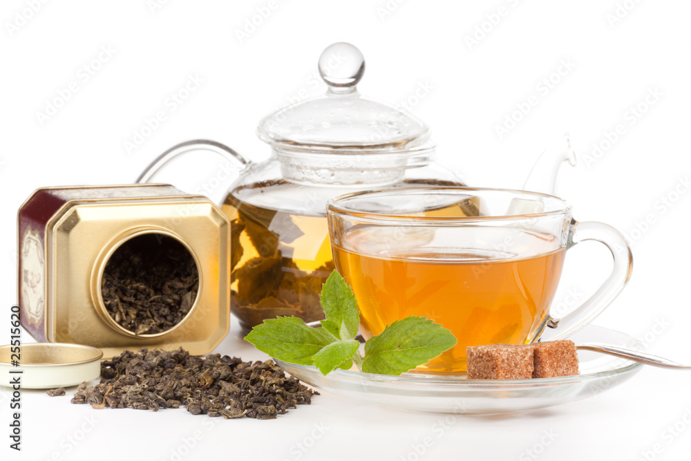 Teapot and cup of tea with mint. Teapot and cup of tea with mint.
