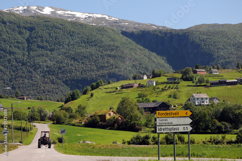 Tractor in countryside above Hardangerfjord, Norway