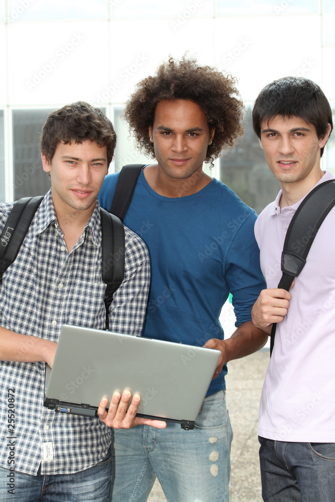 Group of students with laptop computer Group of students with laptop computer